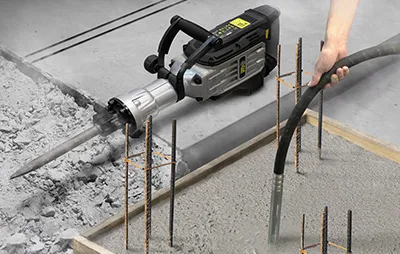 Perforateur, dalle en béton et vibreuse